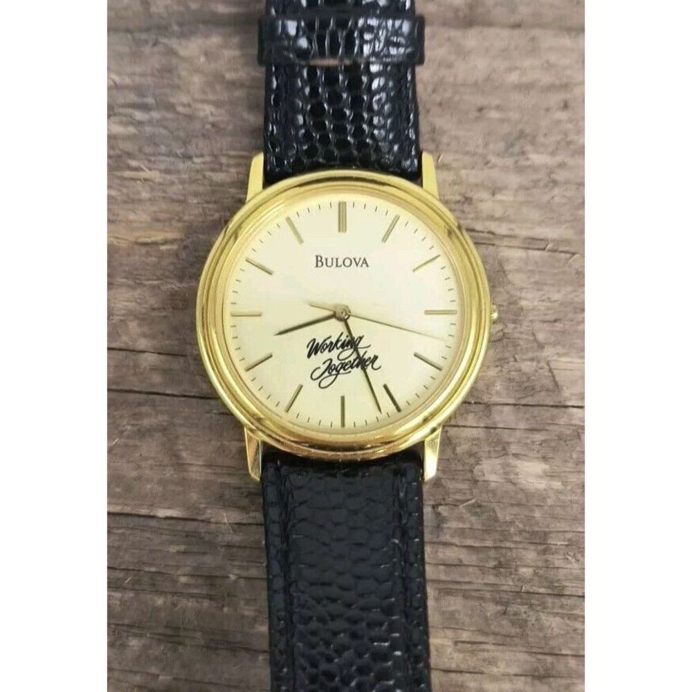 Bullova Classic 33mm "Working Together" Watch Gold Tone Black Leather - Picture 2 of 8
